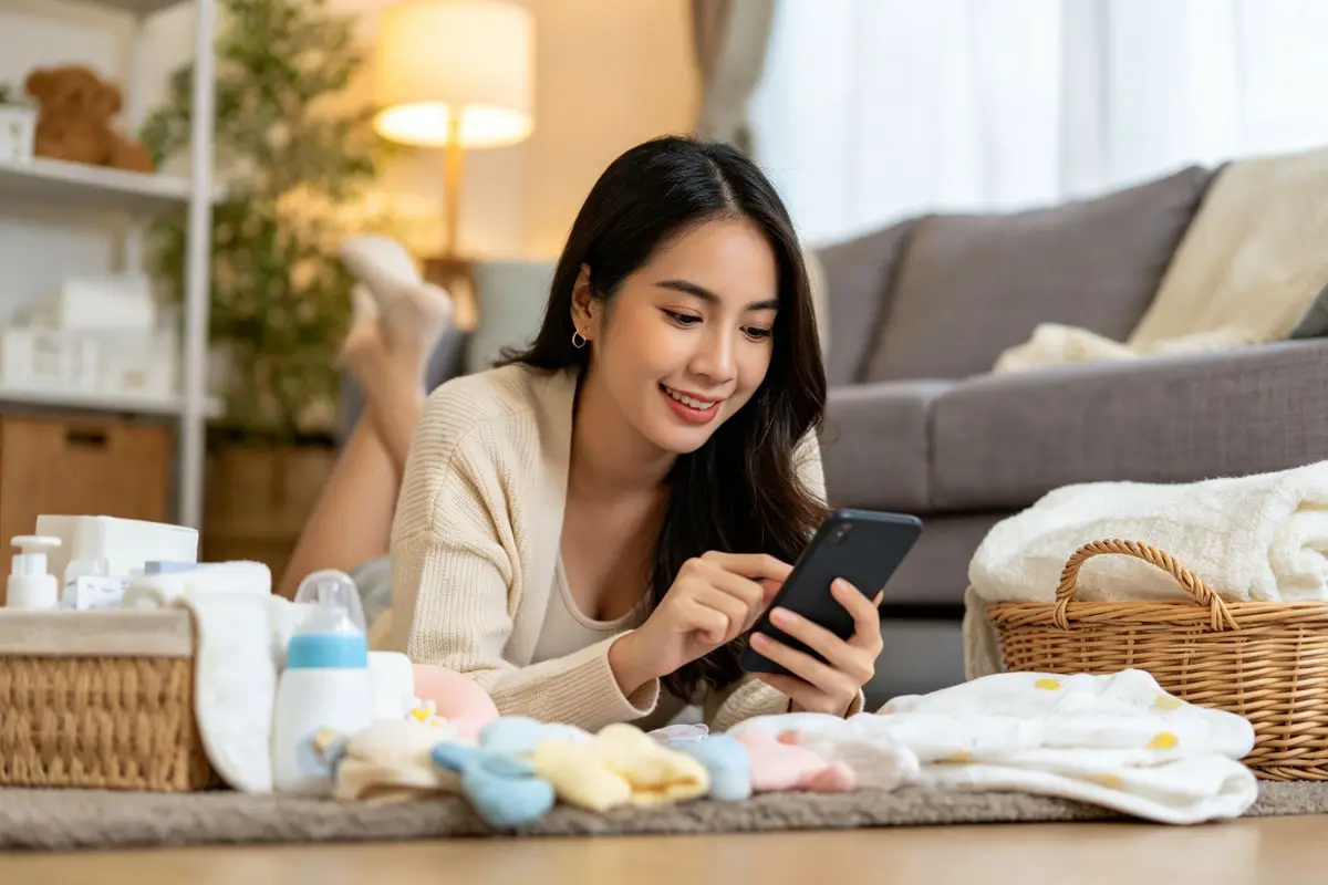 Southeast Asian woman shopping for baby products online